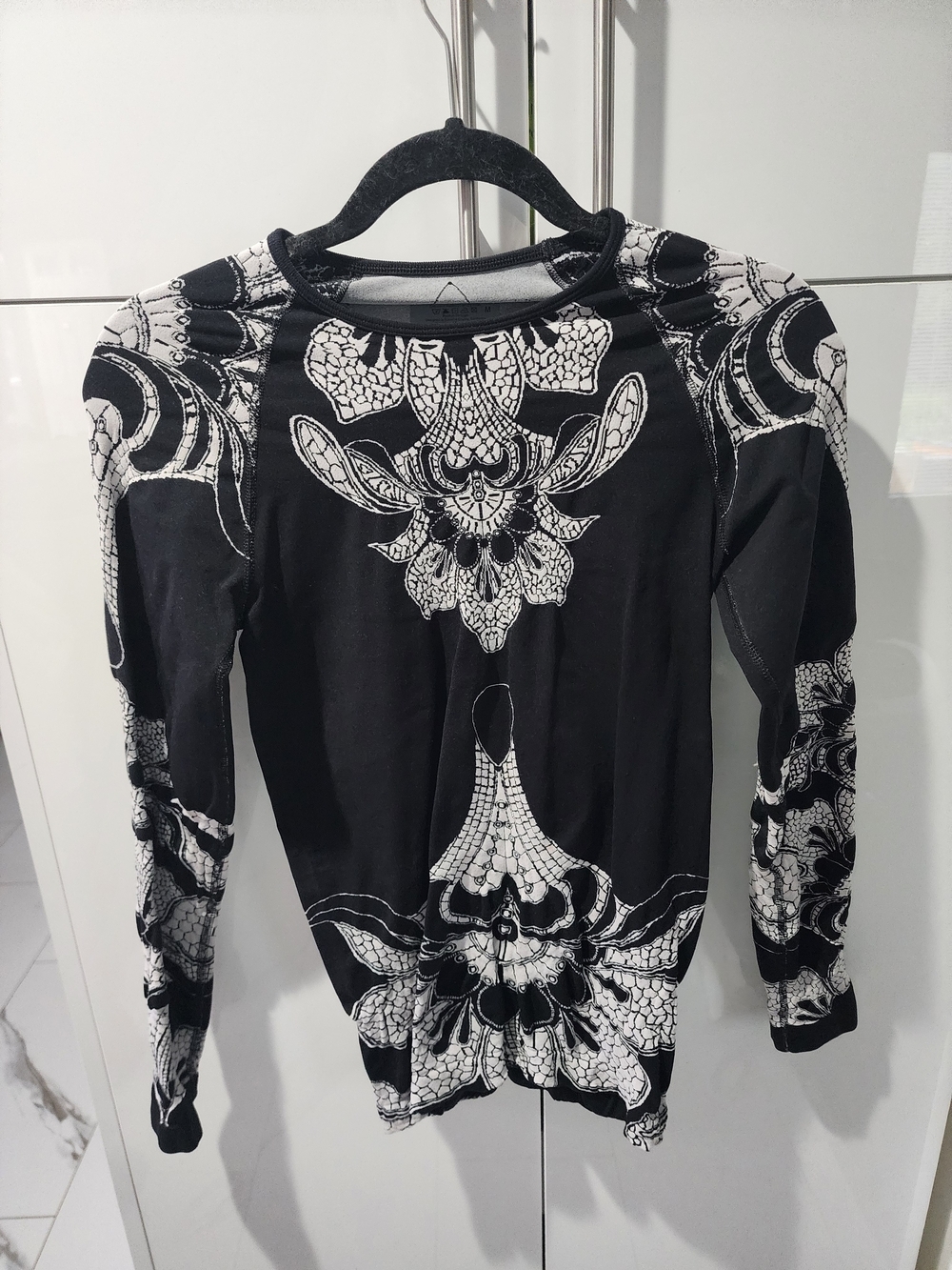Athleta Black and White Ornamental Long Sleeve Top